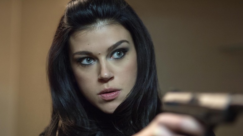 Adrianne Palicki as Ms. Perkins in John Wick