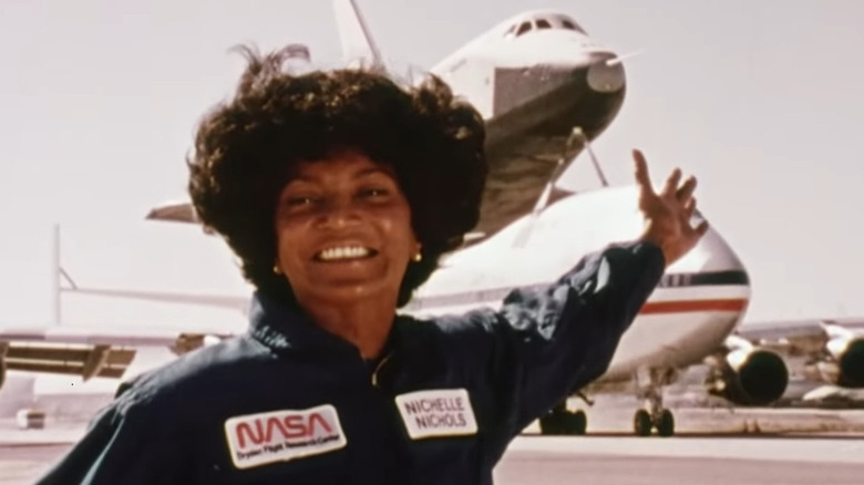 Nichelle Nichols showing off a space shuttle in her NASA recruitment video