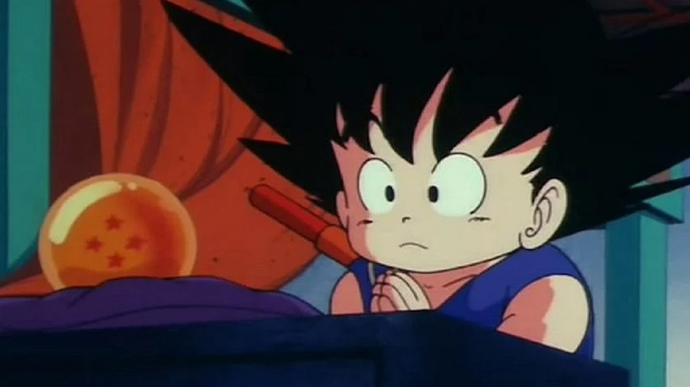 Kid Goku praying to his dragon ball