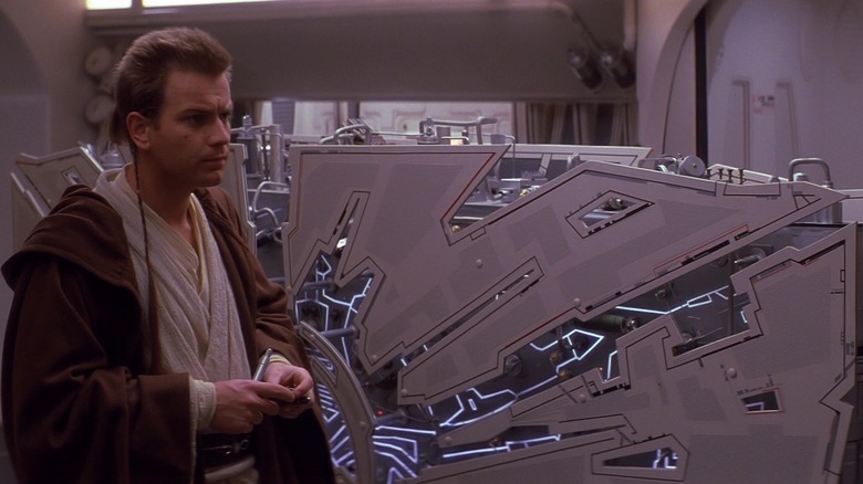 Obi-Wan and a hyperdrive generator in The Phantom Menace