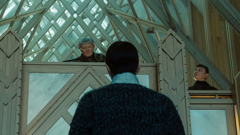 Spock stands before a group of Vulcan elders in the 2009 film 