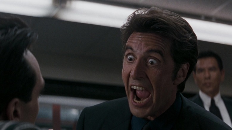 Hank Azaria's Alan Marciano looks up at Al Pacino's Vincent Hanna as he screams in his face in Heat