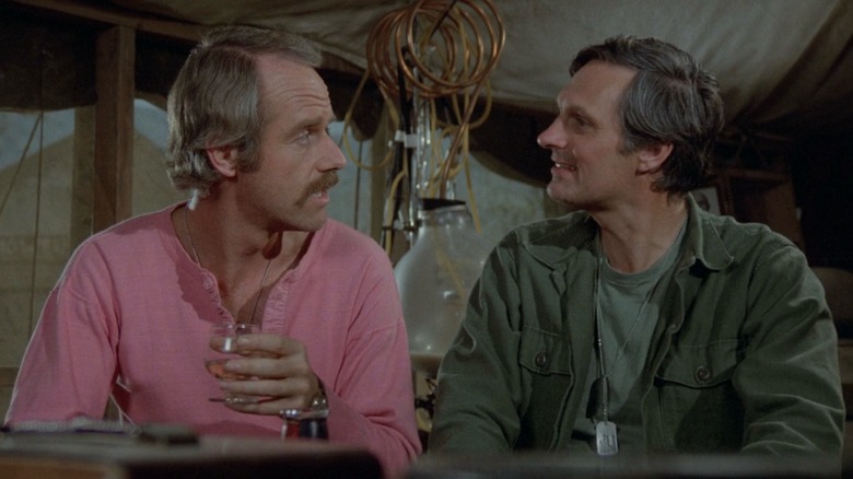 Mike Farrell and Alan Alda on M*A*S*H