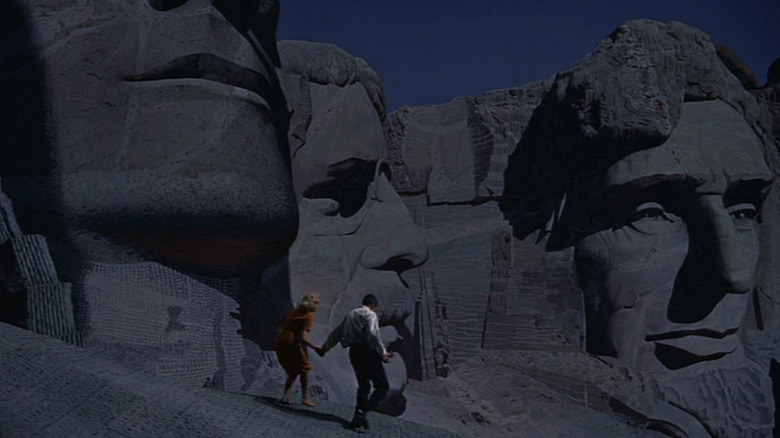 Eva Marie Saint and Cary Grant walking on Mount Rushmore in North by Northwest