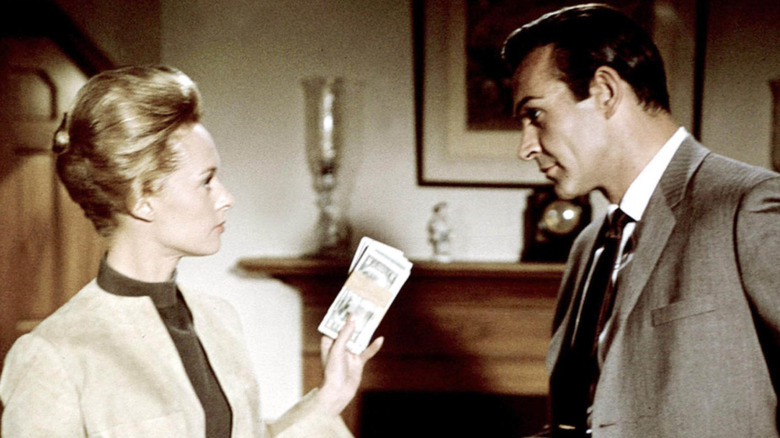 Tippi Hedren gives Sean Connery money in Marnie