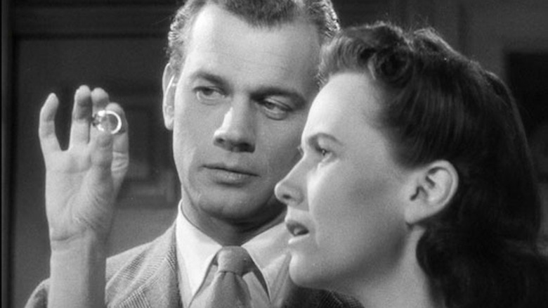 Teresa Wright examines Joseph Cotten's gift of a ring in Shadow of a Doubt