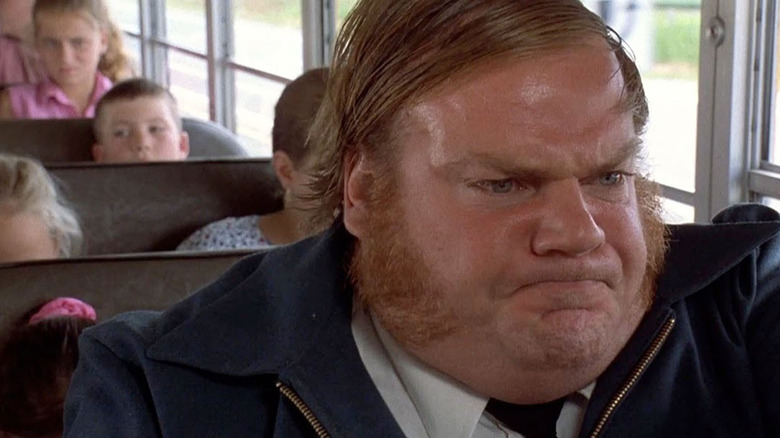 Chris Farley frowning on bus Billy Madison