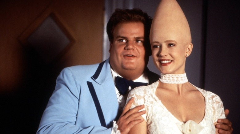 Chris Farley and Michelle Burke standing Coneheads