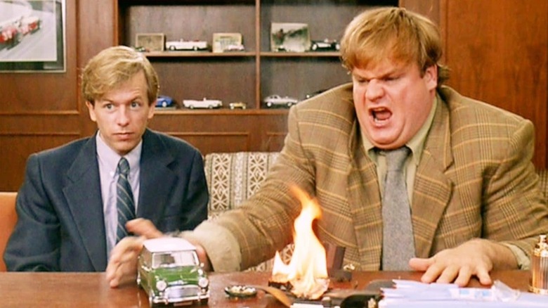 David Spade and Chris Farley at desk