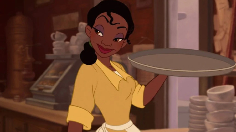 Tiana carrying a plater in The Princess and the Frog