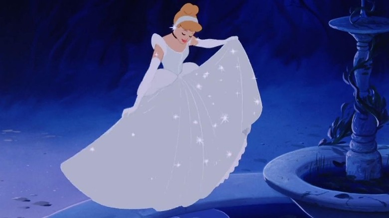 Cinderella examines her new dress in Cinderella (1950)