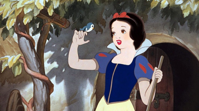 Snow White singing to a bird in Snow White and the Seven Dwarfs