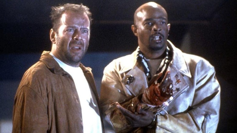 Bruce Willis as Joe Hallenbeck and Damon Wayans as Jimmy Dix witness an explosion in The Last Boy Scout