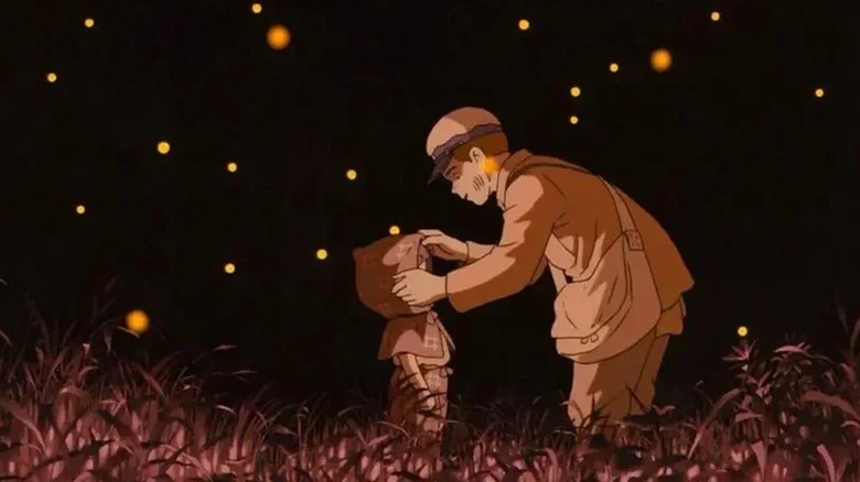 Seita and Setsuko among the fireflies, in a last moment of peace during Grave of the Fireflies.