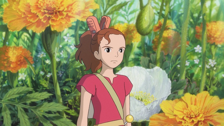 Arrietty explores a floral world in The Secret World of Arrietty