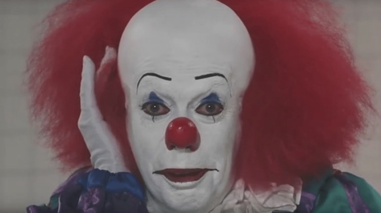 Tim Curry as Pennywise in It miniseries