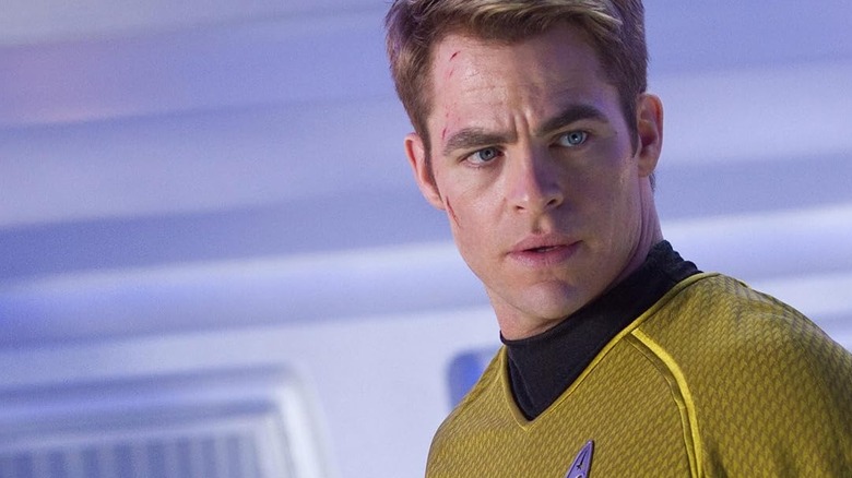 Chris Pine's Captain Kirk looking concerned on the bridge of the Enterprise in Star Trek Into Darkness