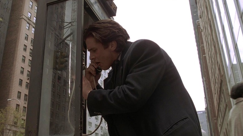 Patrick Bateman worried on phone