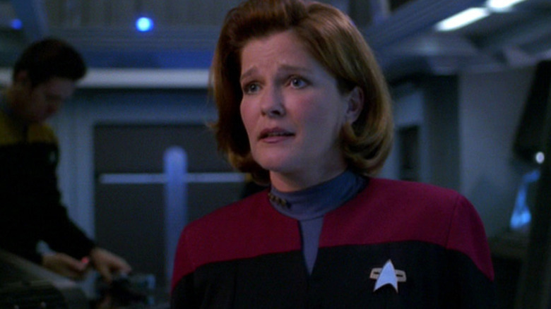 Kate Mulgrew flashes concern as Captain Kathryn Janeway in Star Trek Voyager