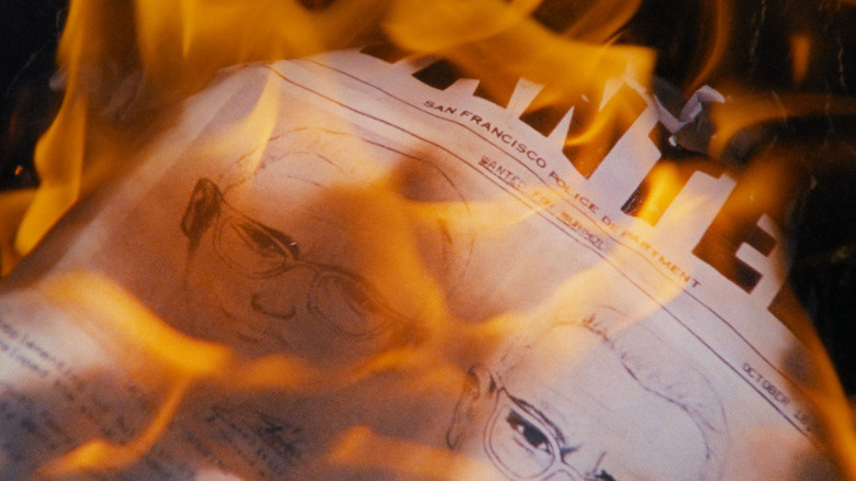 Poster burning by burning by drawing a possible Zodiac killer on him from the Zodiac Killer Project