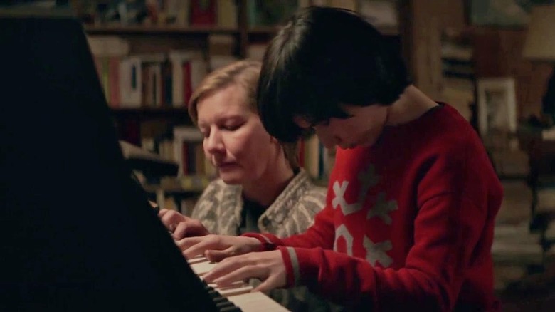 Sandra and Daniel playing a piano in Anatomy of a Fall