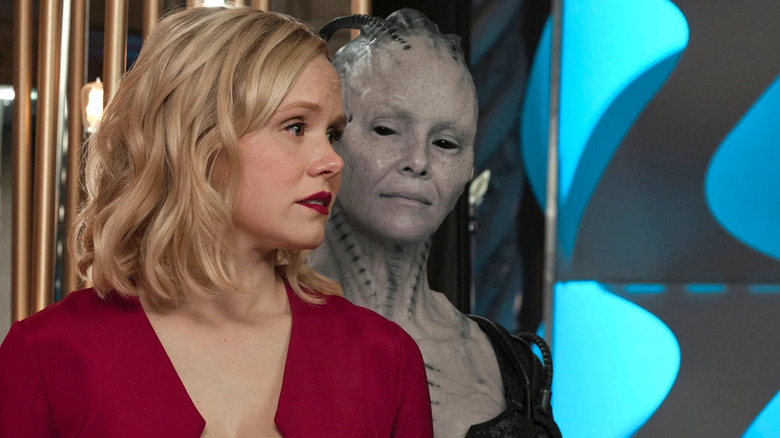 The Borg Queen peering over the Alison Pill's shoulder