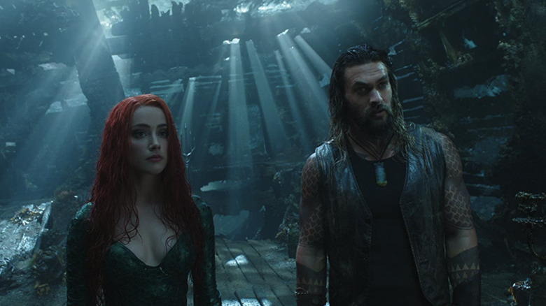 Momoa and Amber Heard underwater in Aquaman