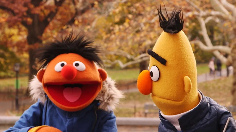 Ernie laughs as Bert stares at him in Sesame Street