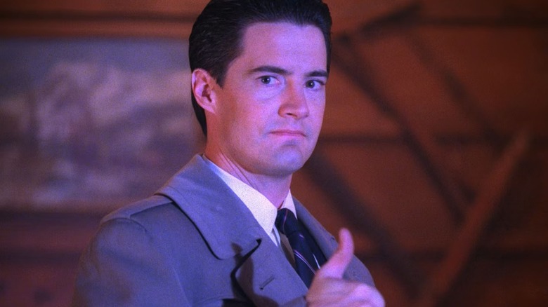 Agent Dale Cooper doing his signature thumbs up in Twin Peaks