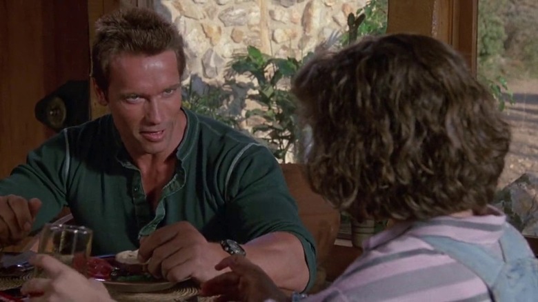Arnold Schwarzenegger and Alyssa Milano in Commando 