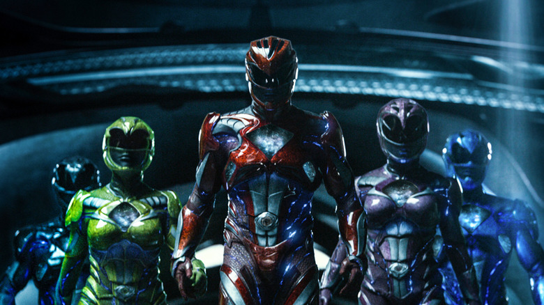 Becky G. as Trini, Ludi Lin as Zack, Dacre Montgomery as Jason, Naomi Scott as Kimberly, and RJ Cyler as Billy suited up in Power Rangers