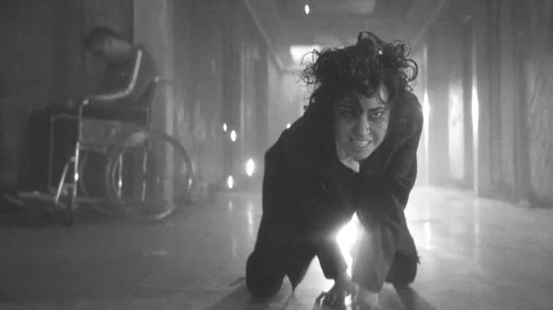 Aubrey Plaza as Lenny crawling on the floor of hospital in Legion