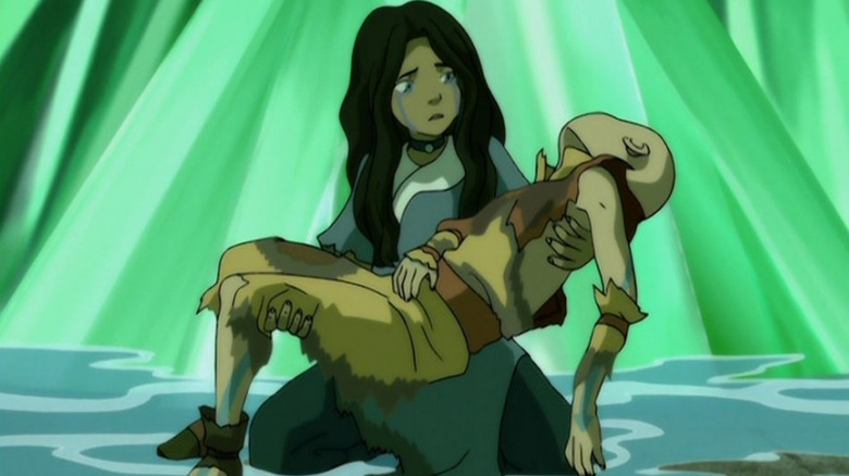 Avatar: The Last Airbender cradling a body