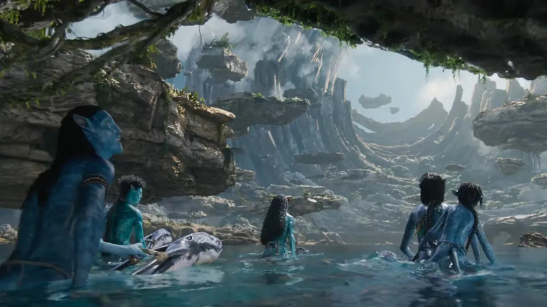 Avatar the way of water sully family looking at ruins