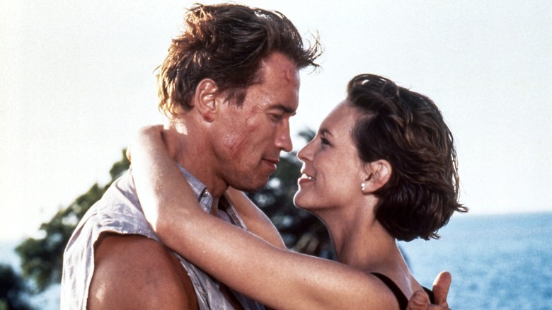 Arnold and Jamie Lee Curtis embrace