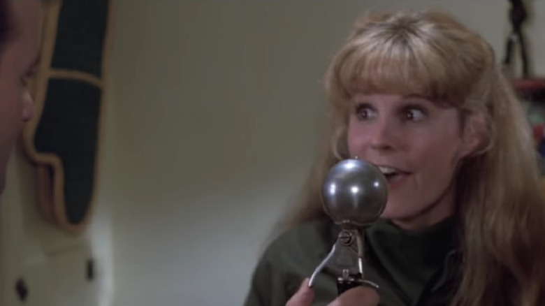 PJ Soles reacts to an ice cream scoop handled by Bill Murray in Stripes (1981)