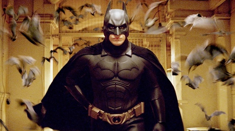 Batman surrounded by bats