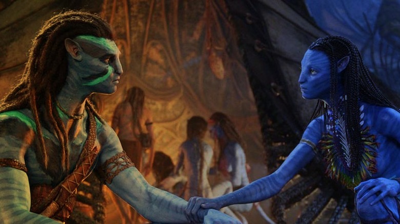 Sam Worthington Jake Sully and Zoe Saldana as Neytiri in Avatar: The Way of Water