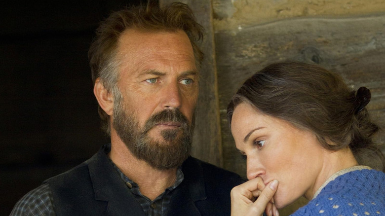 Kevin Costner as William Anderson Hatfield and Sarah Parish as Levicy Hatfield look uncomfortable in Hatfields & McCoys