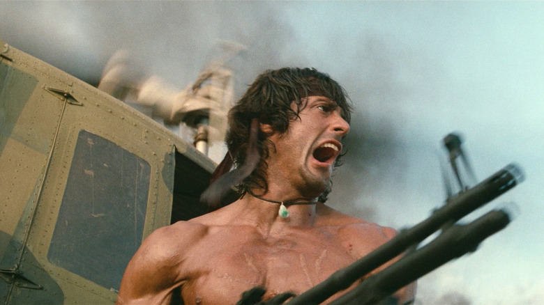 Sylvester Stallone yelling with gun Rambo III