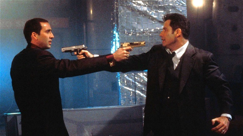 Face/Off Nic Cage and John Travolta Pointing Guns