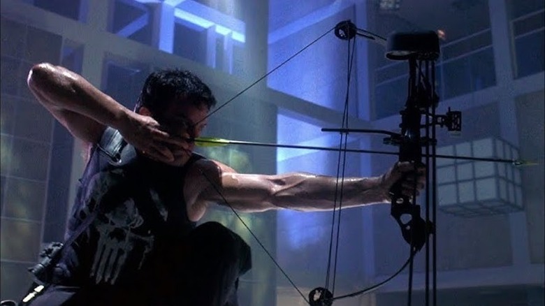 The Punisher aims a bow and arrow