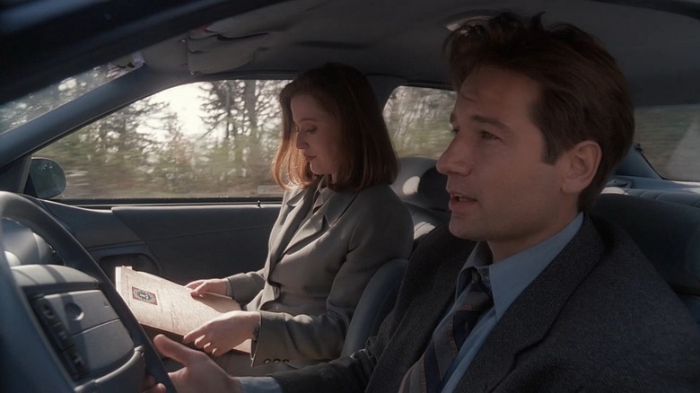 Mulder and Scully driving in The X-Files