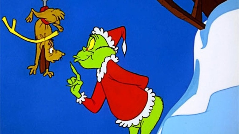 How the Grinch Stole Christmas' Grinch waving finger at dog