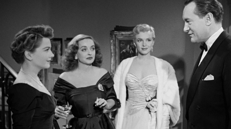 Anne Baxter, Bette Davis, Marilyn Monroe and George Sanders in All About Eve