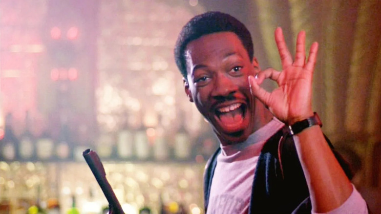 Beverly Hills Cop axel giving ok sign smiling