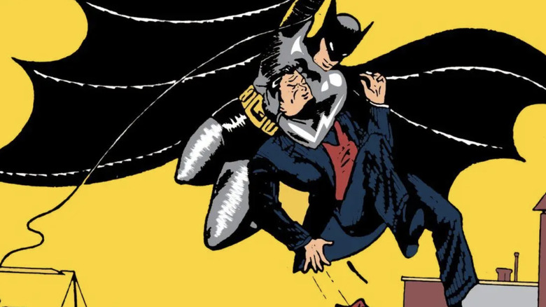 Comics Comics #27 shows Batman swinging in the air, a criminal contract in a close person