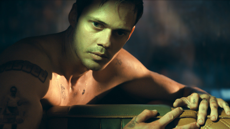 Bill Skarsgår as Eddie, Shirtless and Locked Suspension Car