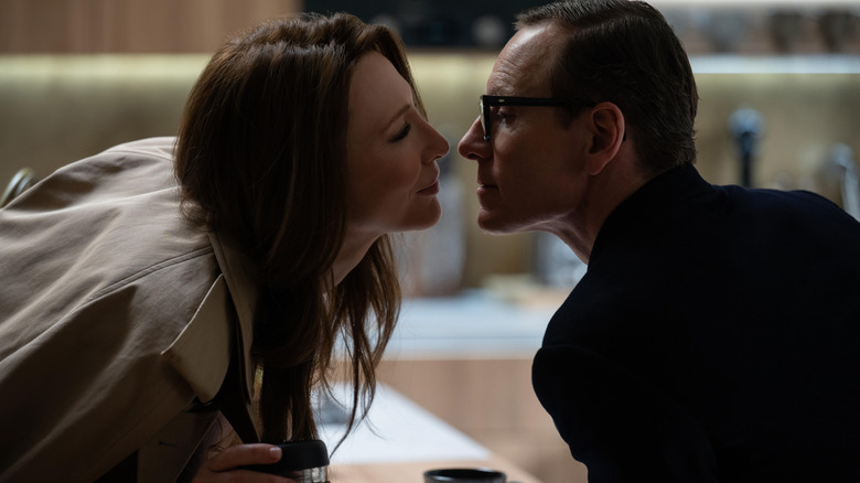 Michael Fassbender as espionage agent George Woodhouse and Cate Blanchett as his wife Kathryn St. Jean leaning in for a kiss in Black Bag