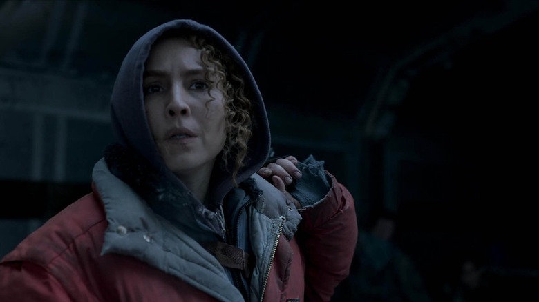 Noomi Rapace in a hoodie